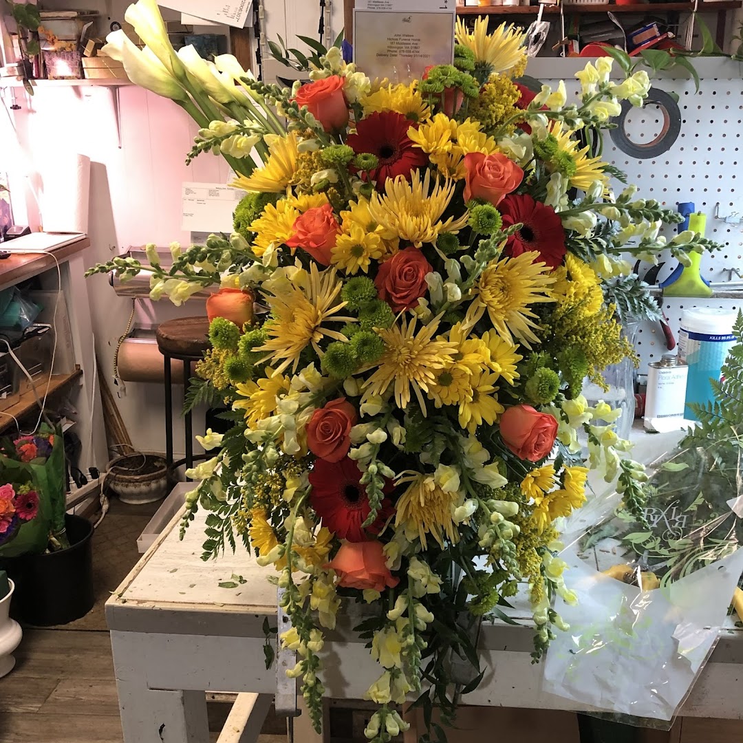 large yellow and orange floral tribute from Designs By Don Florist public photo gallery