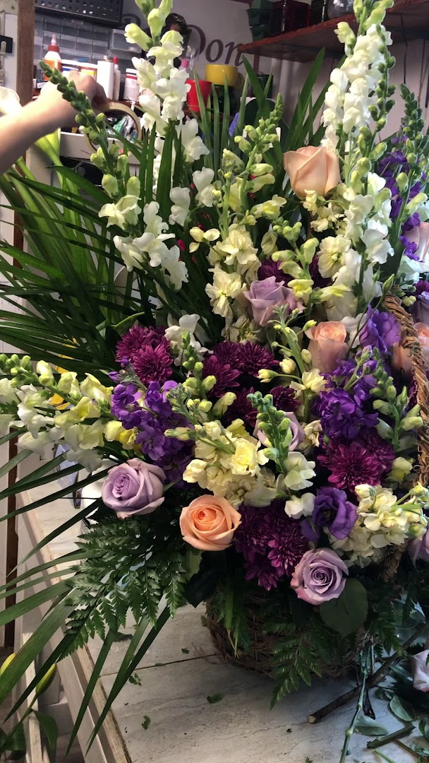 large purple and white funeral arrangement from Designs By Don Florist public photo gallery