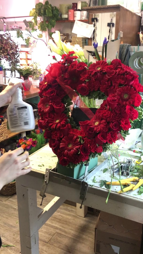 red floral heart being created at Designs By Don Florist